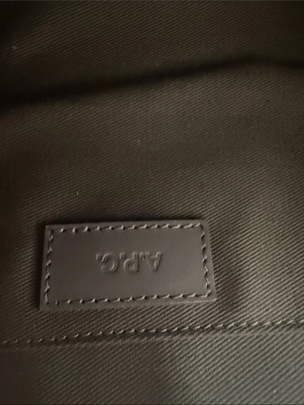 A.P.C. Half-Moon Leather Crossbody Bag in Black with Gold Logo